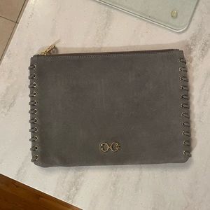C. Wonder Suede Clutch